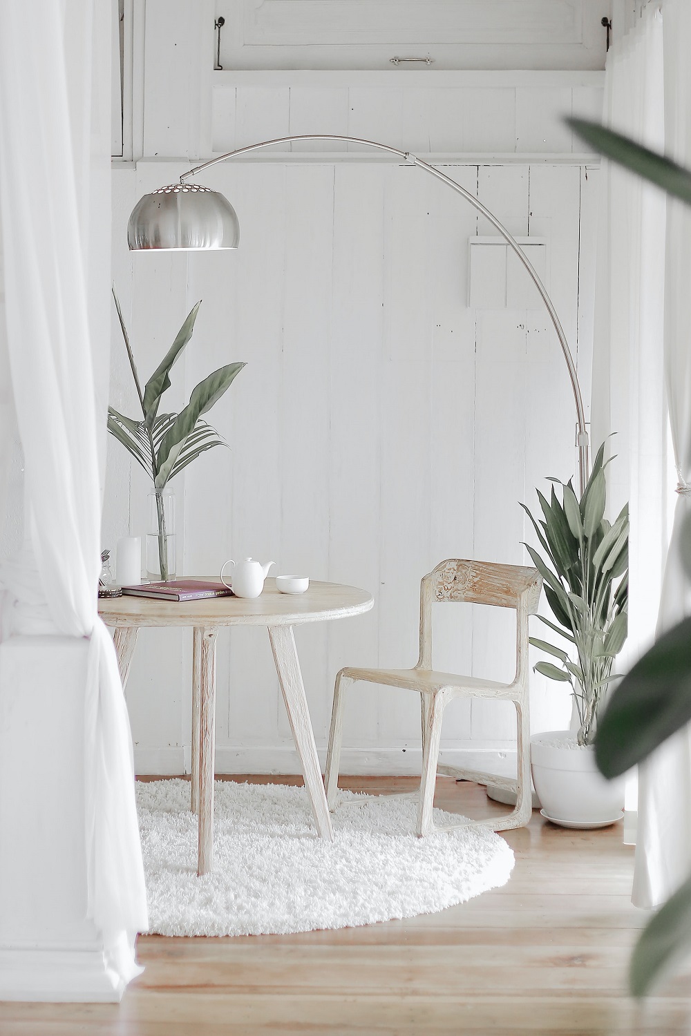white wood chair with white wood table
